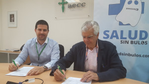 Carlos Mateos e Ignacio Muñoz, durante la firma