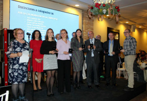 Foto de familia con algunos de los galardonas en la fiesta de conmemoración de la Patrona de COF Toledo