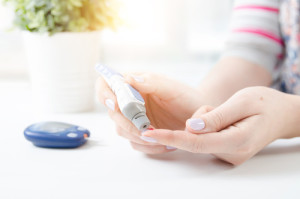 Diabetes doing blood glucose measurement.